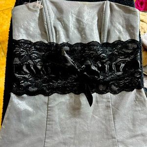 Silver glitter and black strapless top. Very versatile and cute!